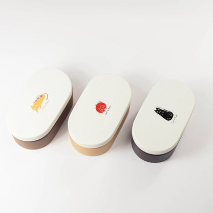 Chat du Café 木目小判弁当箱 3色展開 — うめ猫・シャケ梅・のり猫を斜め上から見た全体像